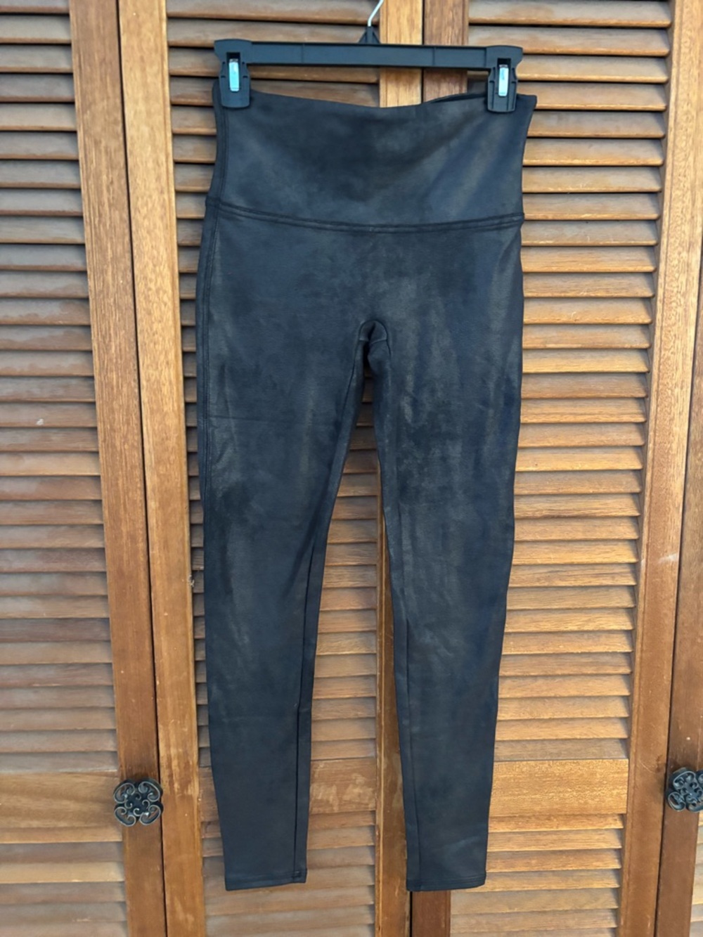 SPANX Black faux leather leggings. Size medium.